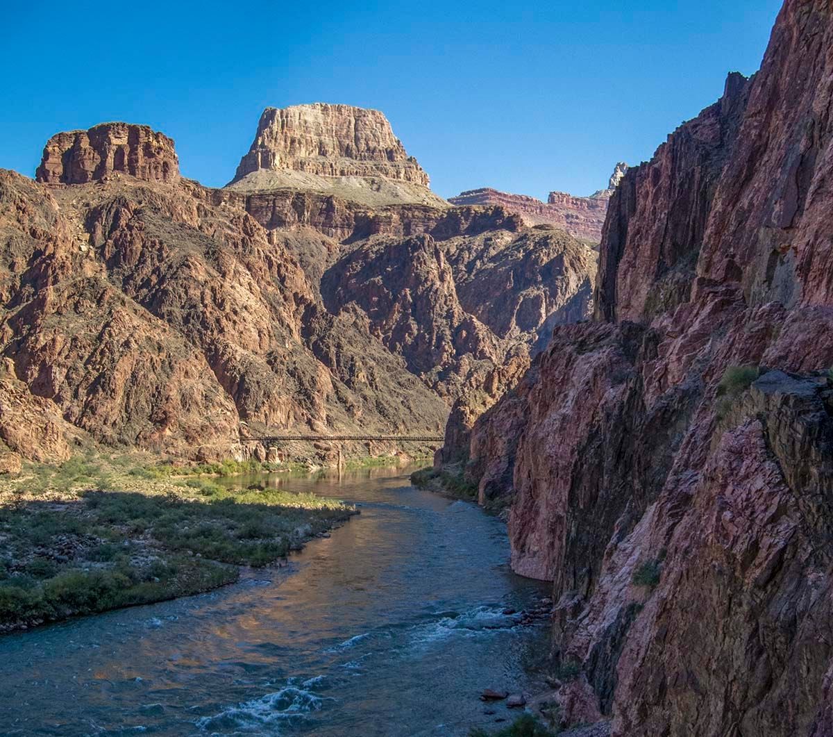 The River Trail runs along the edge of an almost sheer cliff above the Colorado River (NPS Photo)